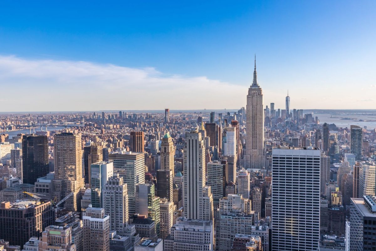 Aerial high-angle view of the Midtown Manhattan skyline in New York City, representing luxury real estate and bridge loan financing.
