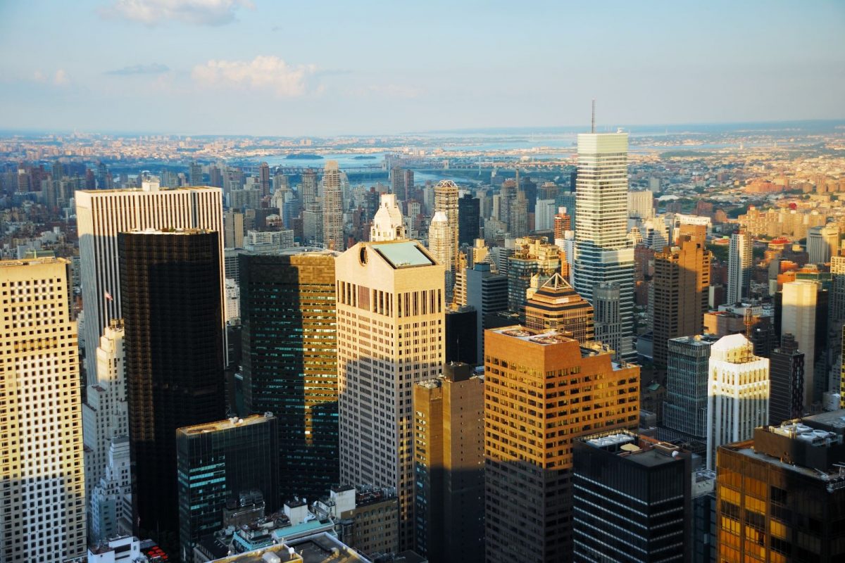 Luxury Manhattan and Miami skyline view representing high-value US real estate equity available for international bridging loan financing.