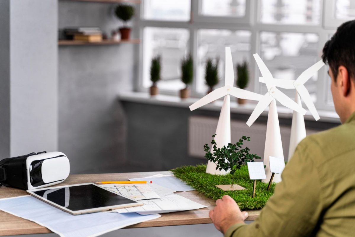 Solar panels and wind turbines representing renewable energy projects financed through private credit in Asia Pacific