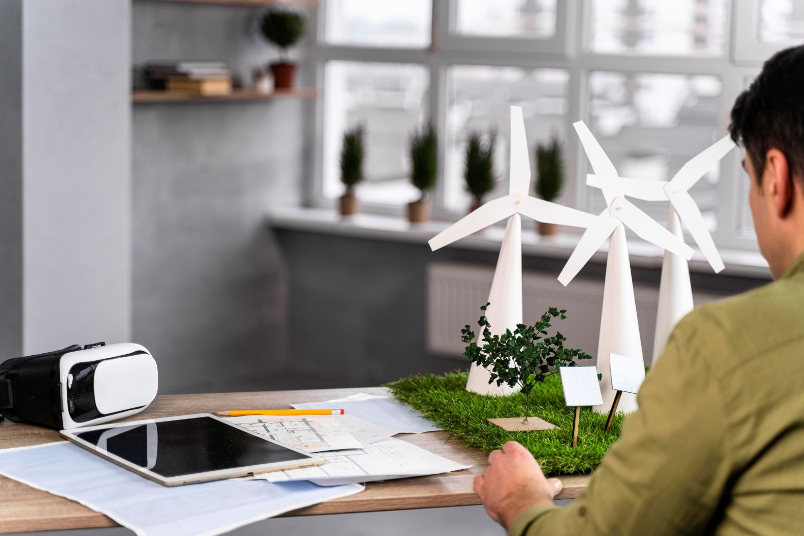 Solar panels and wind turbines representing renewable energy projects financed through private credit in Asia Pacific