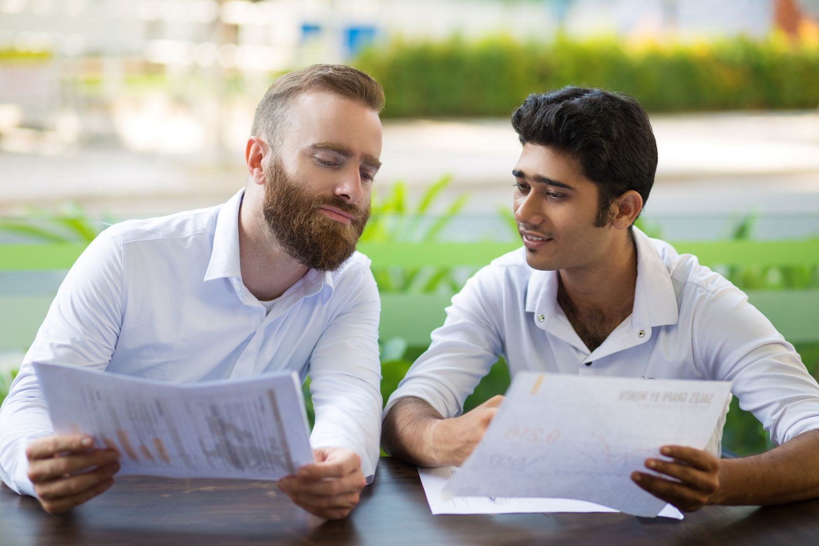 High-net-worth homeowner reviewing frequently asked questions about asset-based bridge loans for luxury real estate financing