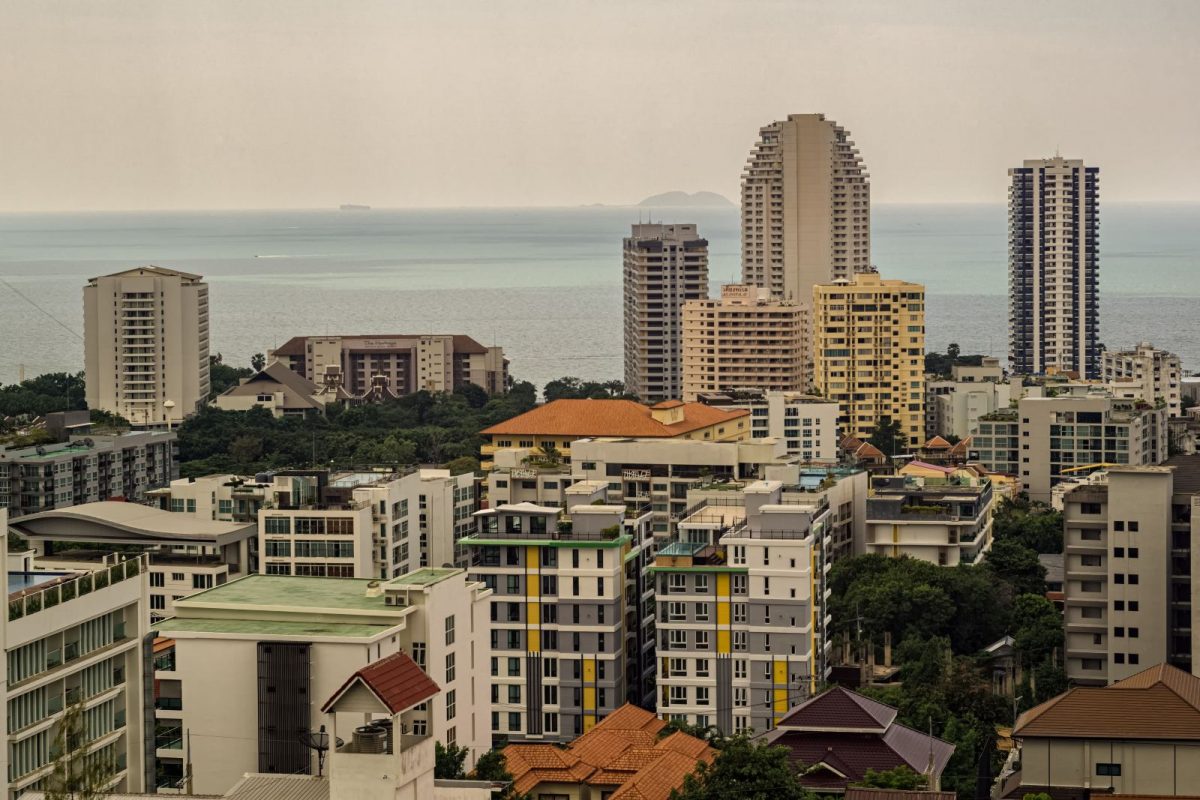 Comparison of a Bangkok freehold condominium and a Phuket leasehold villa representing Thailand property ownership structures